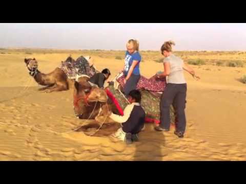 Camel riding in Sam desert