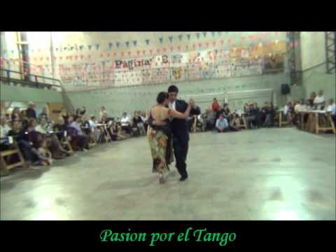  Maria Ines Bogado  and  Sebastian Jimenez  are  dancing  to  the  milonga  "  Reliquias Porteñas  "