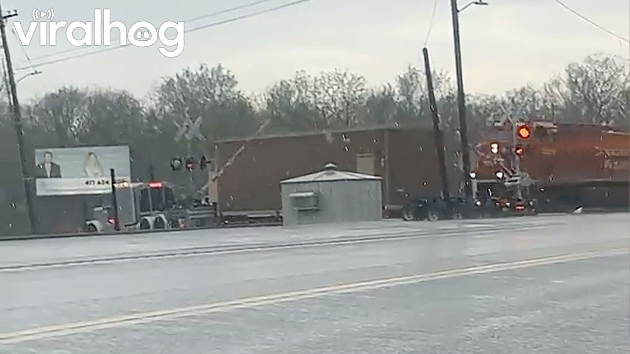 Train Crashes into Wide Load Semi Truck || ViralHog