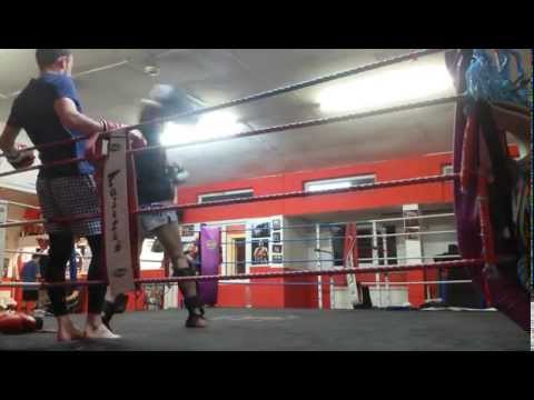 Jack Prichici on pads with Alex "Bodyhammer" Bublea