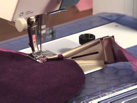 45) BERNINA presser feet -- Binder attachment #84 and foot #94