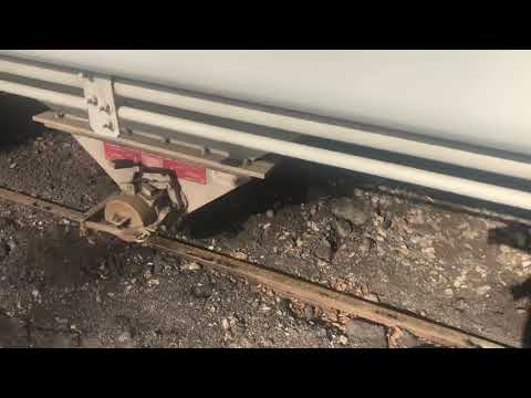 Dow plastics Railcar with two types of unload valves on the same Railcar