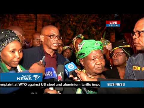 Stompie's mother signs condolence book for Mama Winnie