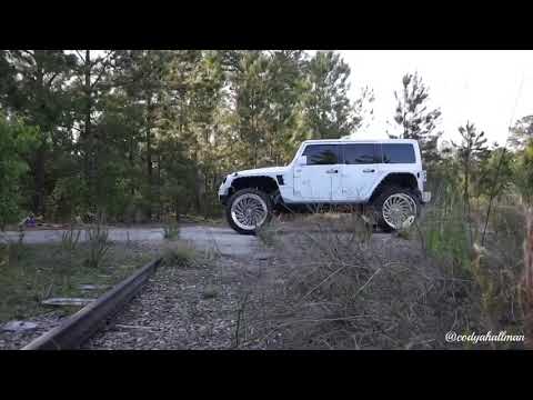 Jeep on 26x14 American Force Wheels