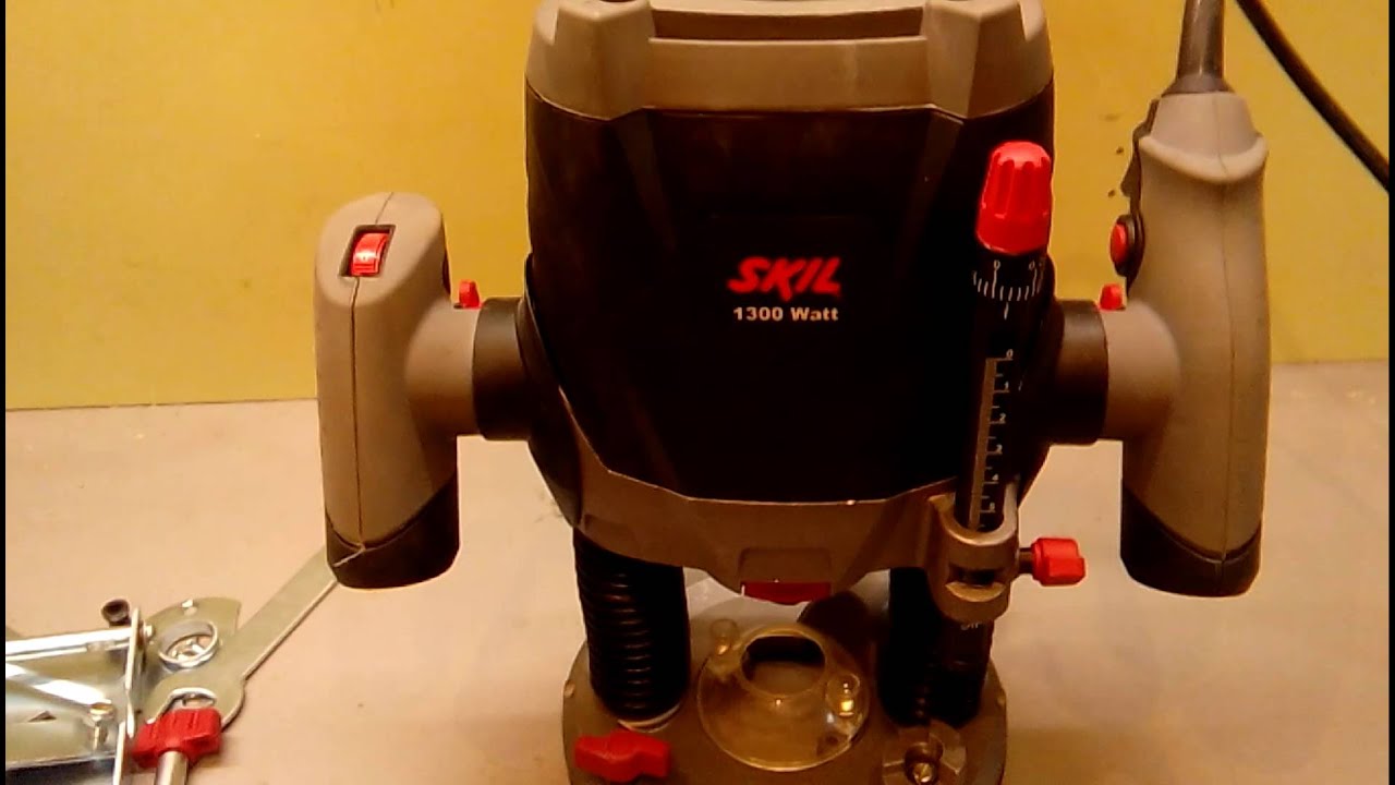 Фрезер SKIL 1840 LA (F 015 184 0LA)  1300Вт 28000об/мин макс.ход 60мм диам.хв.6-8мм