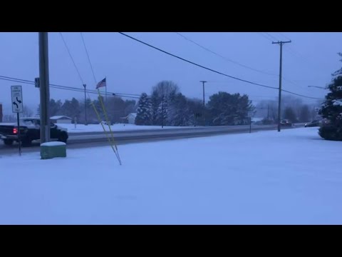 Heavy snow blankets the thumb area of Michigan