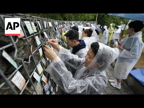 Wall of nametags at South Korean park reflects adoptees' search for birth mothers