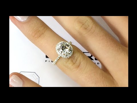 Oval Diamond Engagement Ring in Yellow Gold Double Halo