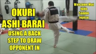 OKURI ASHI BARAI USING A BACK STEP TO DRAW OPPONENT IN