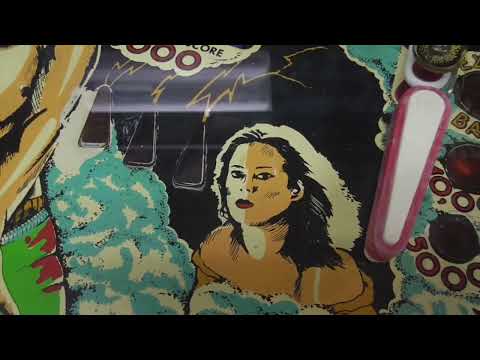 Repainting wear on a 1979 FLASH Pinball Machine Playfield - She's supposed to look like that!