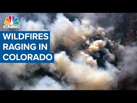 Wildfires are raging in Colorado, destroying homes and forcing hundreds to evacuate