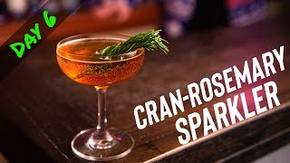 Cran-Rosemary Sparkler | A Festive Gin & Champagne Cocktail