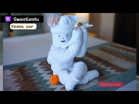 towel art | om swastiastu towel folding technique | how to make towel art to decorate bed | origami