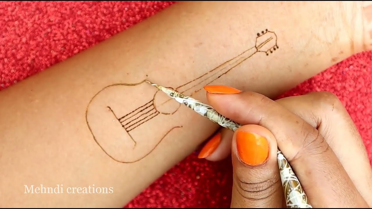 simple tattoo mehndi design guitar by mehndi creations