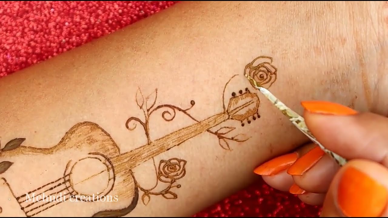 simple tattoo mehndi design guitar by mehndi creations