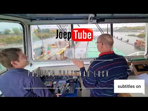 Motor vessel Stroombank passing the Holtenau lock of the Kiel Canal - time laps video inc VHF radio