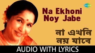Download lagu Na Ekhoni Noy Jabe with lyrics | Asha Bhosle | R.D.Burman mp3 Download lagu Na Ekhoni Noy Jabe with lyrics | Asha Bhosle | R.D.Burman mp3