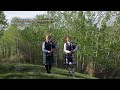 Bill Hawes and Jeanie Hawes playing The Drunken Piper March on the bagpipes.