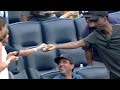 Chris Rock secures a foul ball, then gives it to a young fan to make his day