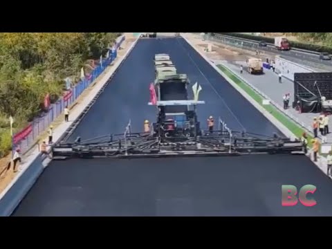 China Unveils First 98-Mile Road Built Entirely by Robots