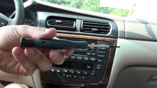 Remove a Double DIN stereo without dealer keys.