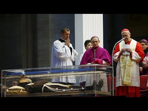 The body of the controversial Padre Pio arrived in procession in Rome
