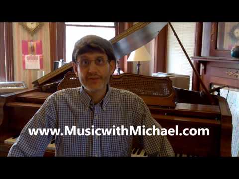 Piano students talk with Andrew Staupe, concert pianist