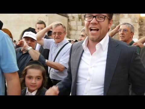 Aish Kodesh Chevra Marching to the Kosel Erev Shabbos