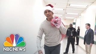 Barack Obama Delivers Holiday Gifts Wearing Santa Hat At Children’s Hospital | NBC News