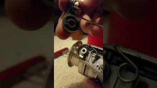 How to fix a spring for an open bail reel