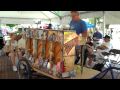 Mr. B plays music on his Joybox Express bike on Wednesday at the Street Art Fair