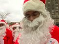 NYC Holds 107th Sidewalk Santa Parade