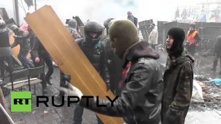 Ukraine: Flaming Molotovs flung at police with slingshot