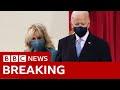 Joe Biden and his wife Jill arrive on th