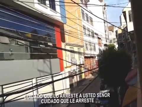 POLICIA BOXEADOR MAMANI AGREDE BRUTALMENTE A DIPLOMATICO VENEZOLANO