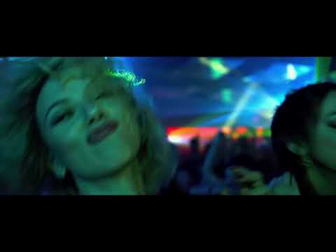 Lucy trailer frame of Scarlett Johansson staring directly into the camera with black background