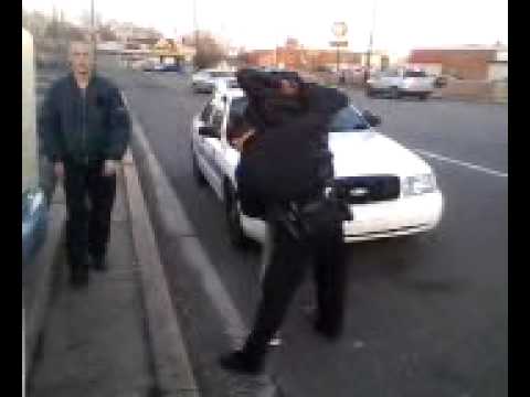 Police swarming in on a suspect at the bus stop...