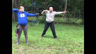 Compound Bow and Japanese Longbow (Yumi) At Full Draw