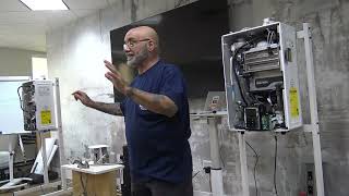 Training plumbers on how to correctly install a tankless with Navien