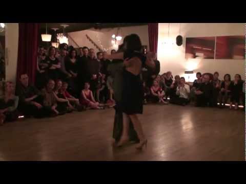  Adrian Costa  and  Amanda Costa  are  dancing  to  a  vals