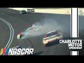 Kyle Busch spins out while racing Daniel Suárez for the lead at Charlotte