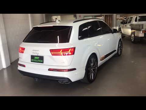 Audi SQ7 aluminium quarter with a sharp body line dent and paint chip