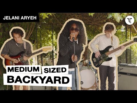 Jelani Aryeh Performs in the Medium Sized Backyard