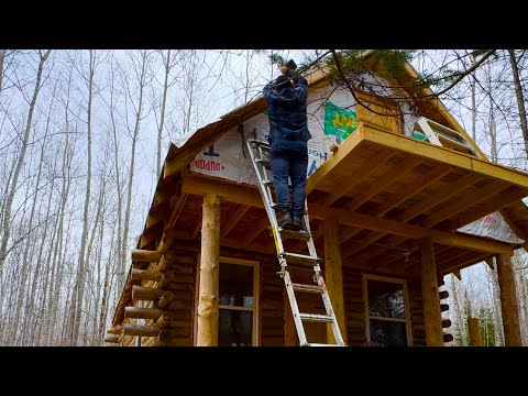 Working on the roof of my off grid log cabin,alone in the forest, woodwork,survival.