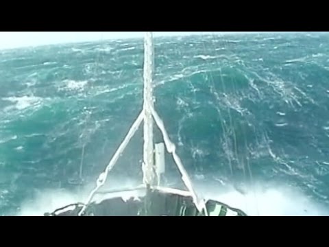 A tug boat in a 12 strength ! rogue wave