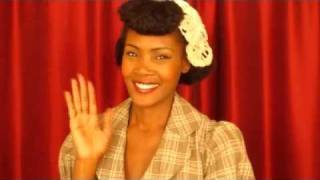 1940s Pin up Inspired Hairstyle With Faux Bangs for Kinky Hair