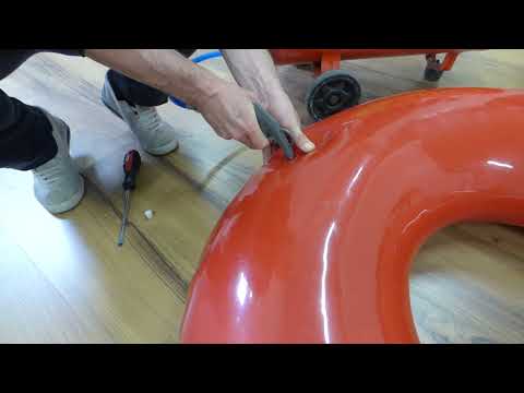 Inflation of a rotomolded tube with a short nozzle device