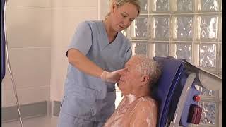 Arjo Carino silla de higiene video de demostración - Español