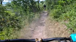 Running laps on NPR trail of the Emerald Mountain Pedal Bike Park.