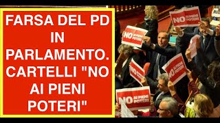 FARSA DEL PD IN PARLAMENTO. CARTELLI "NO AI PIENI POTERI"